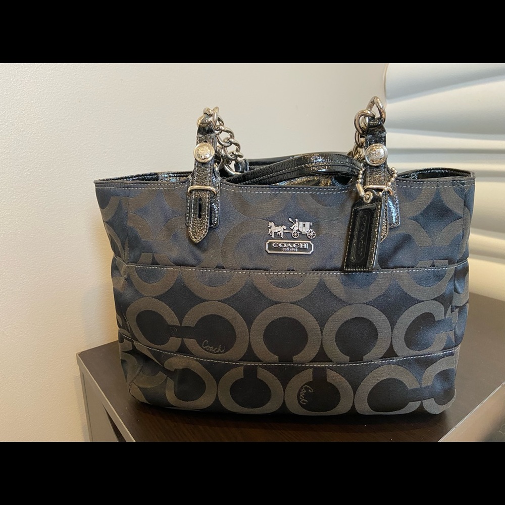 Coach Poppy Op Art Glam handbag with coated straps. Black.